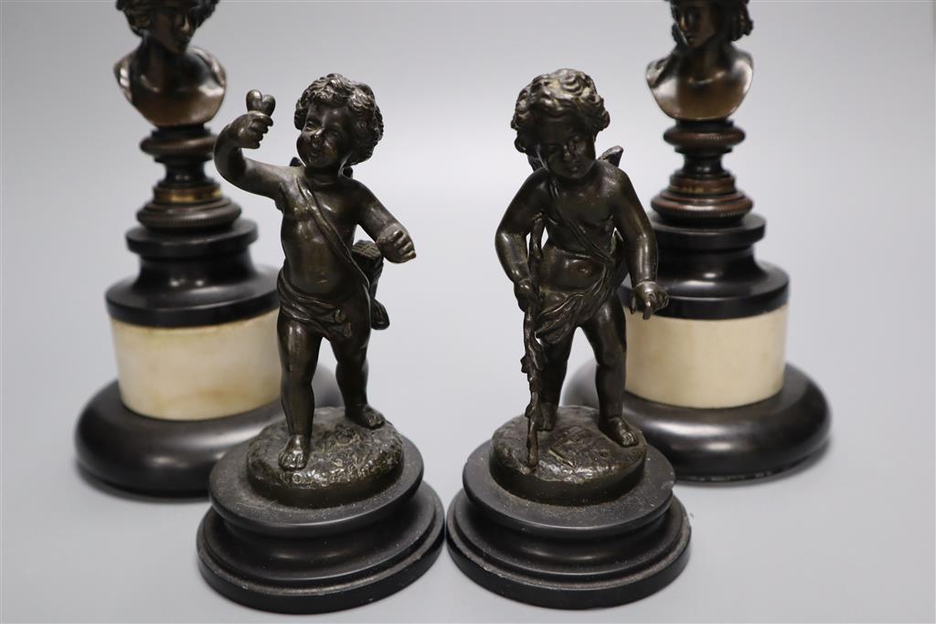 A pair of Regency small bronze busts and a pair of figures of cherubs, tallest 16cm